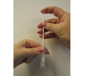 Afbeelding: na de test swab terug in buisje