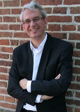 Foto van dirigent Paul de Kok 
